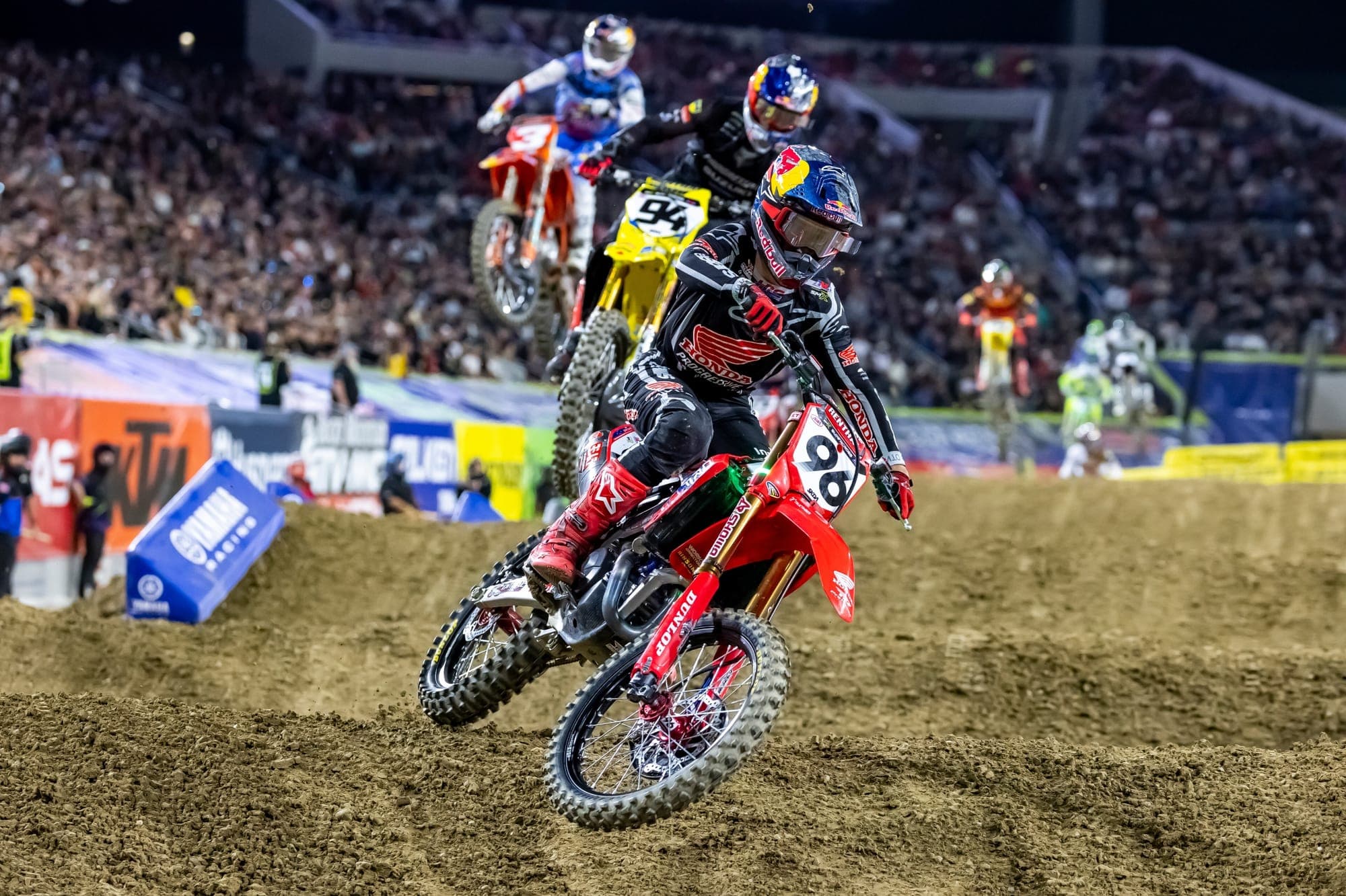 Hunter Lawrence leads Ken Roczen and Eli Tomac during the 2026 San Diego Supercross